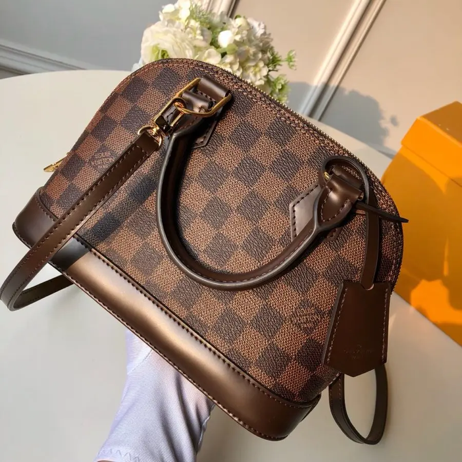 Louis Vuitton Alma Bridge Handbags 