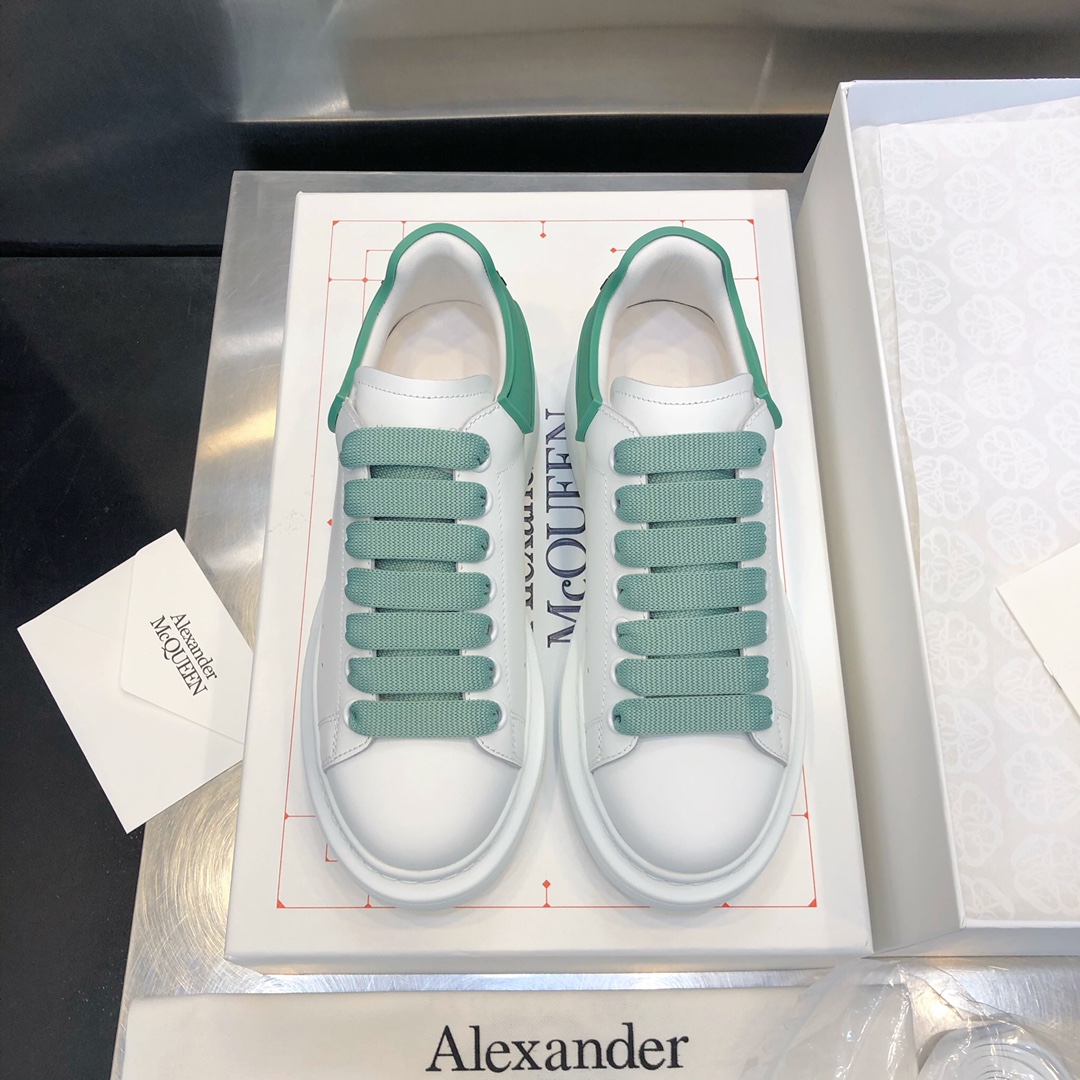 MCQ Oversized Sneaker in Green Lace and Heel
