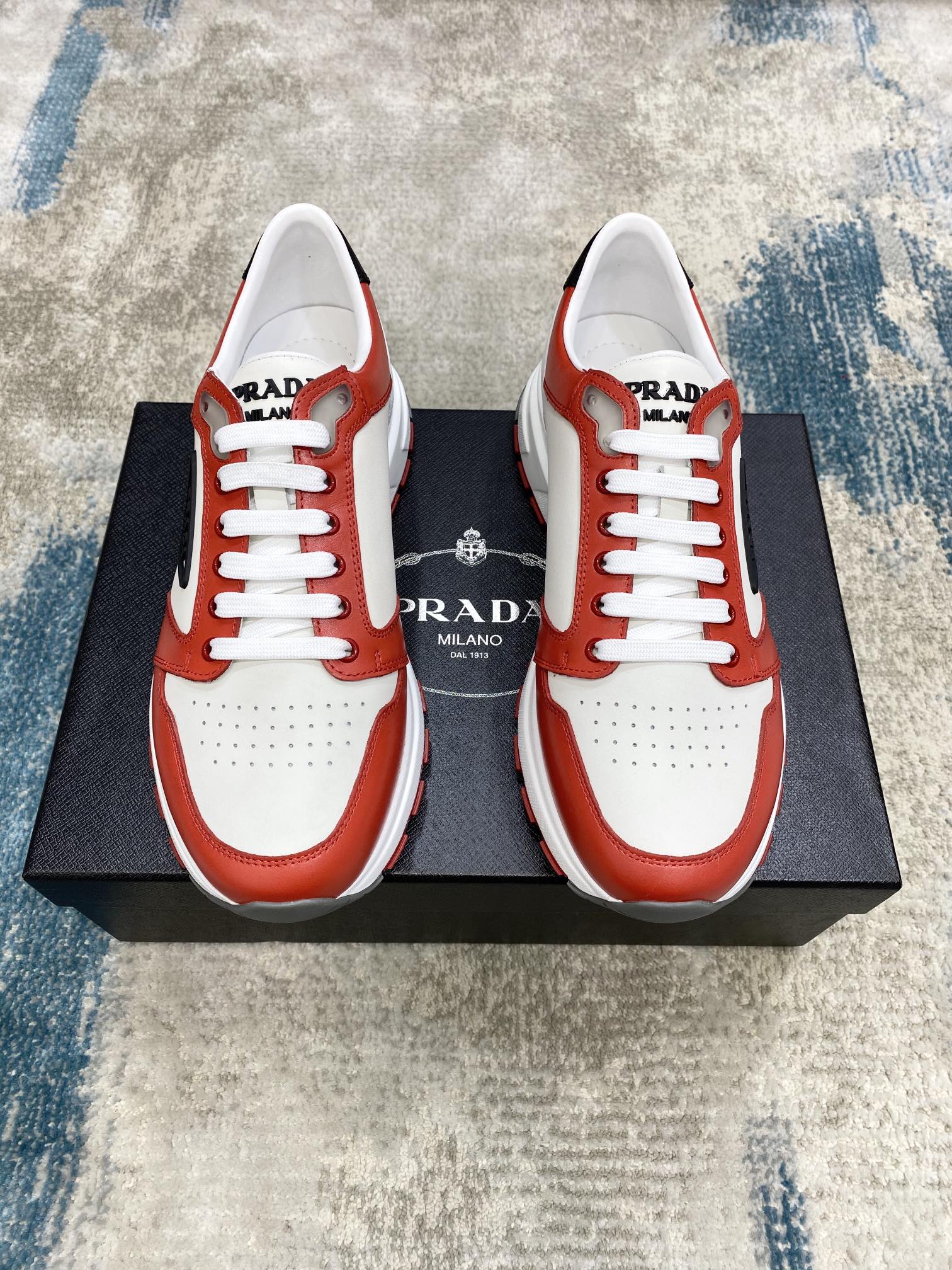 Prada Leisure Sneaker in White with Red