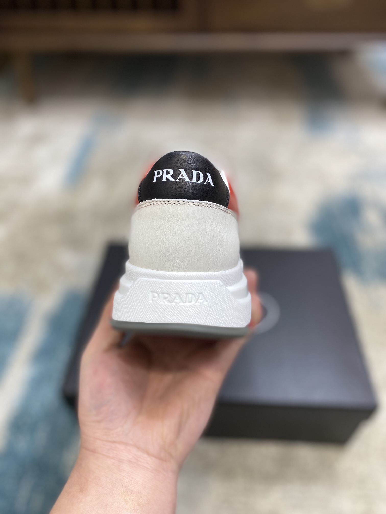 Prada Leisure Sneaker in White with Red