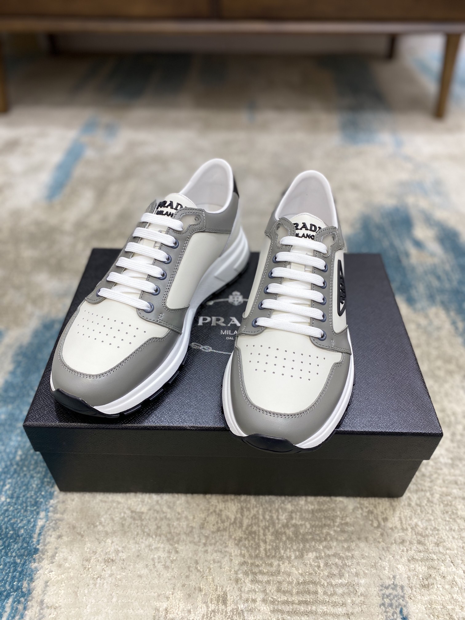 Prada Leisure Sneaker in White with Grey