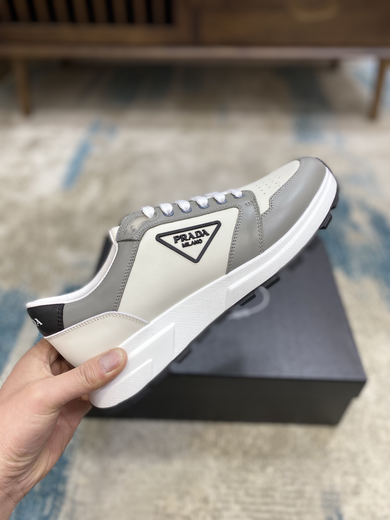 Prada Leisure Sneaker in White with Grey