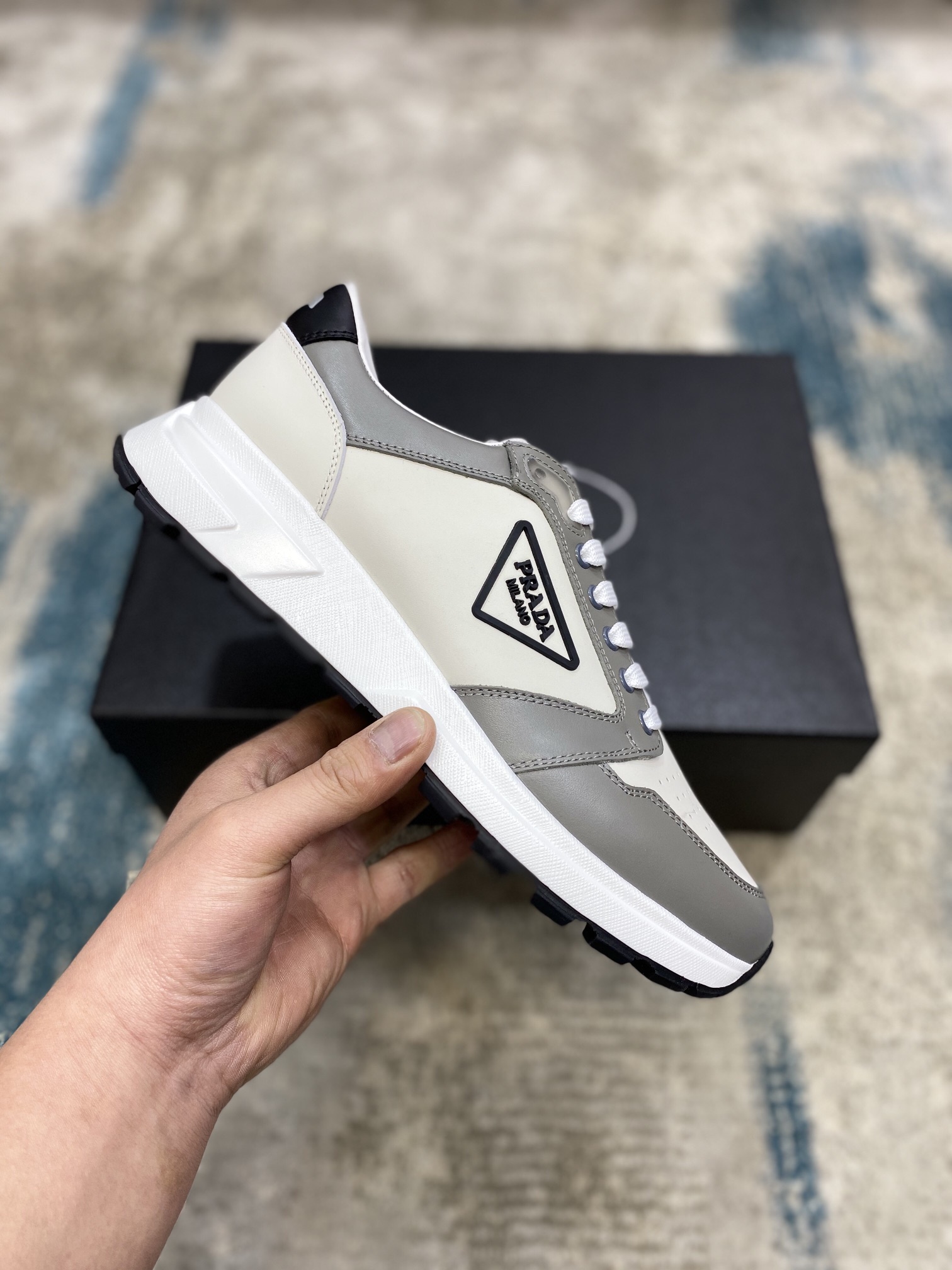 Prada Leisure Sneaker in White with Grey