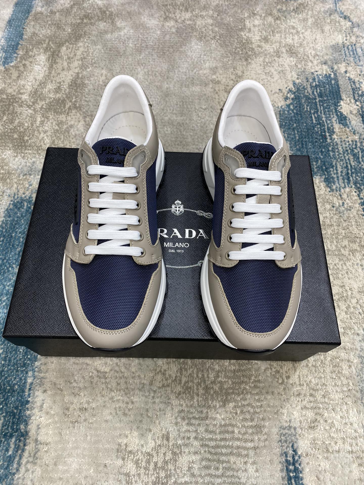 Prada Leisure Sneaker in Blue with Brown