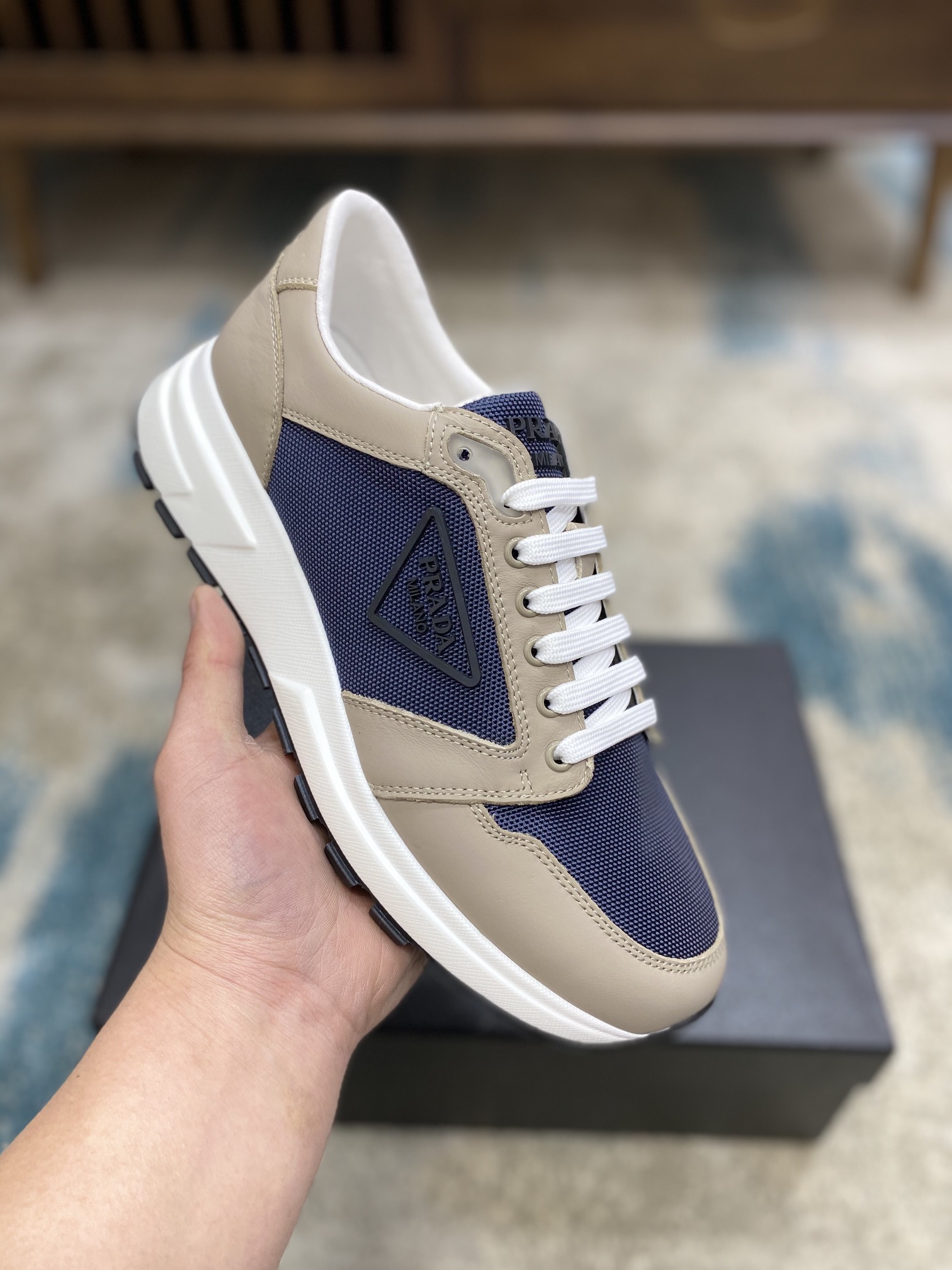 Prada Leisure Sneaker in Blue with Brown