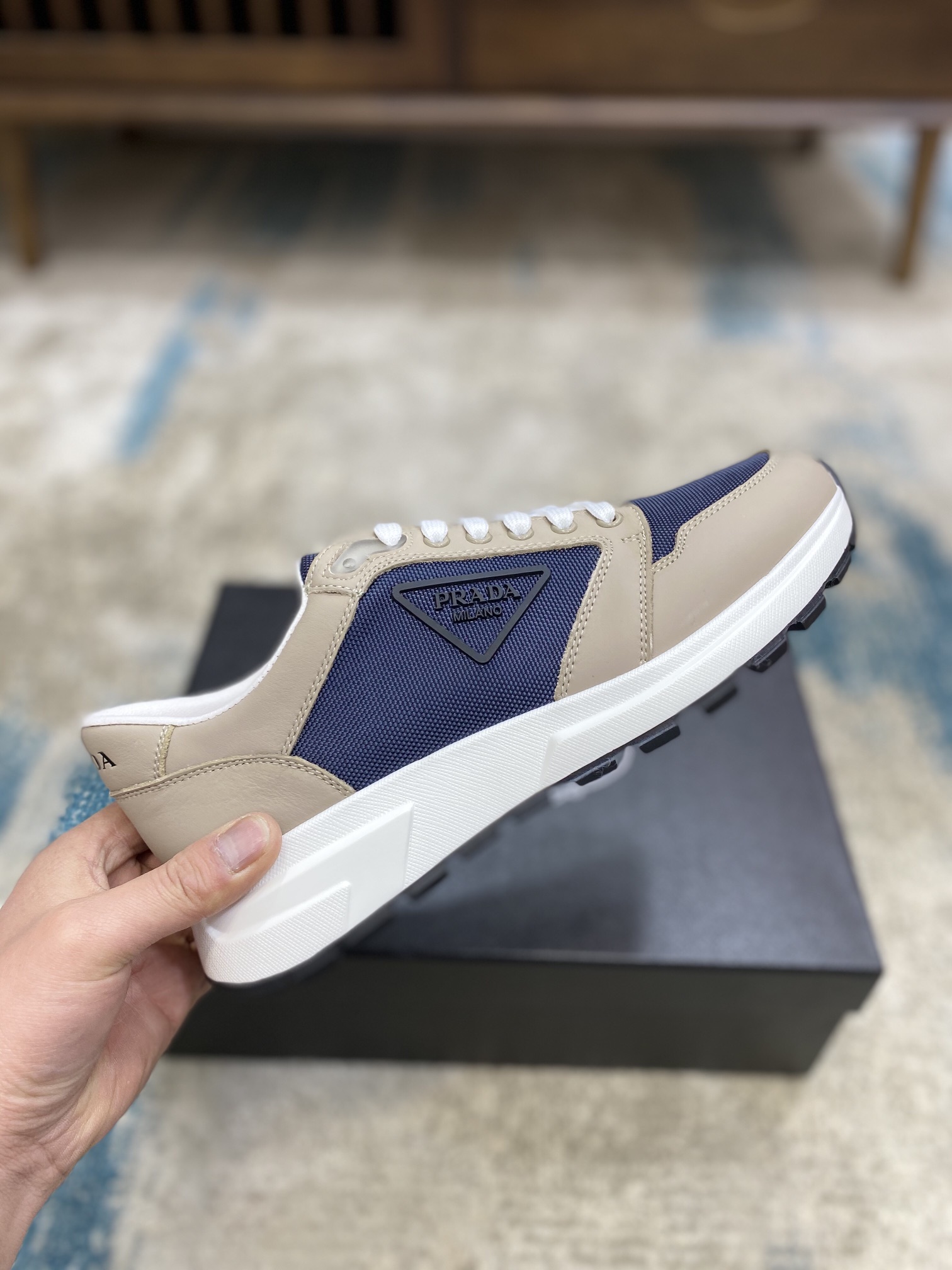 Prada Leisure Sneaker in Blue with Brown