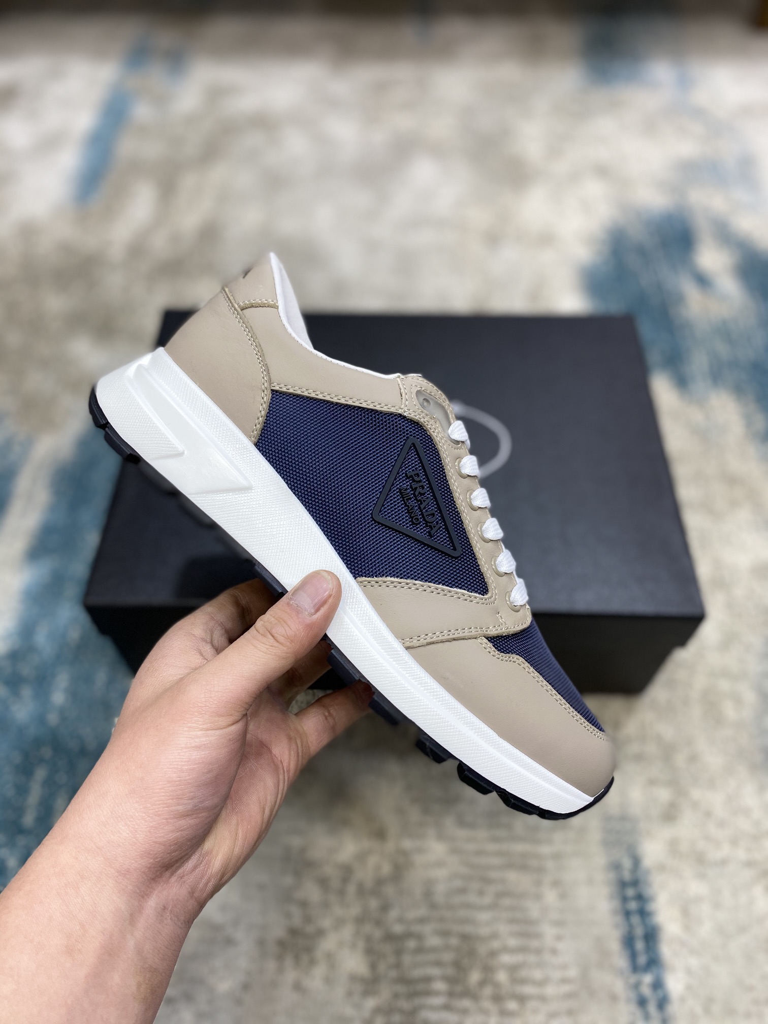 Prada Leisure Sneaker in Blue with Brown