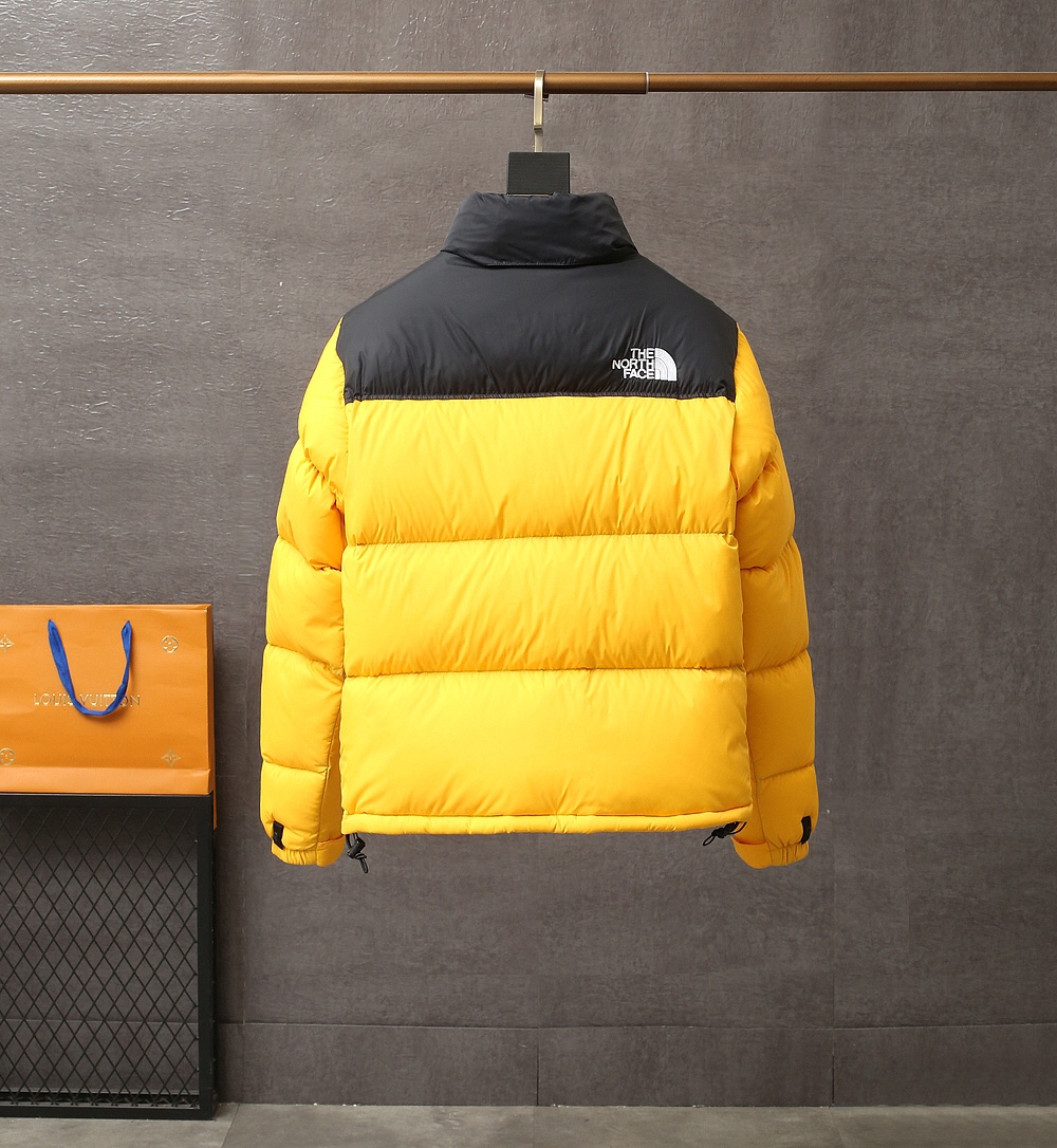 The North Face Down Jacket in Yellow