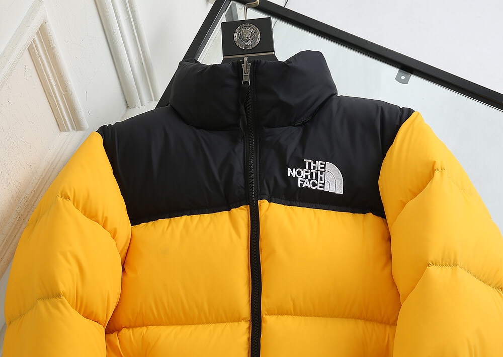 The North Face Down Jacket in Yellow