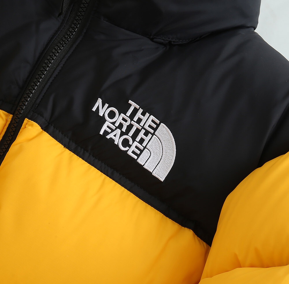 The North Face Down Jacket in Yellow